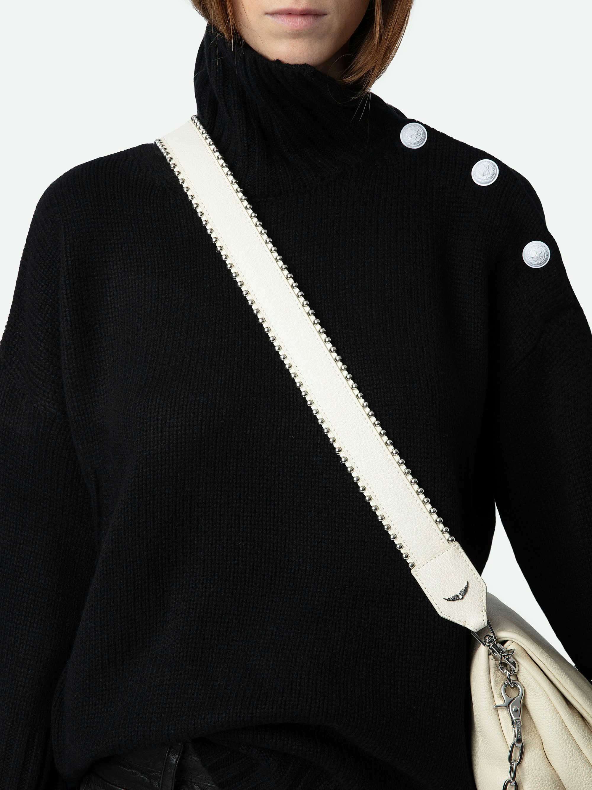 Bandoulière Studs - Bandoulière en cuir grainé à liserés cloutés.